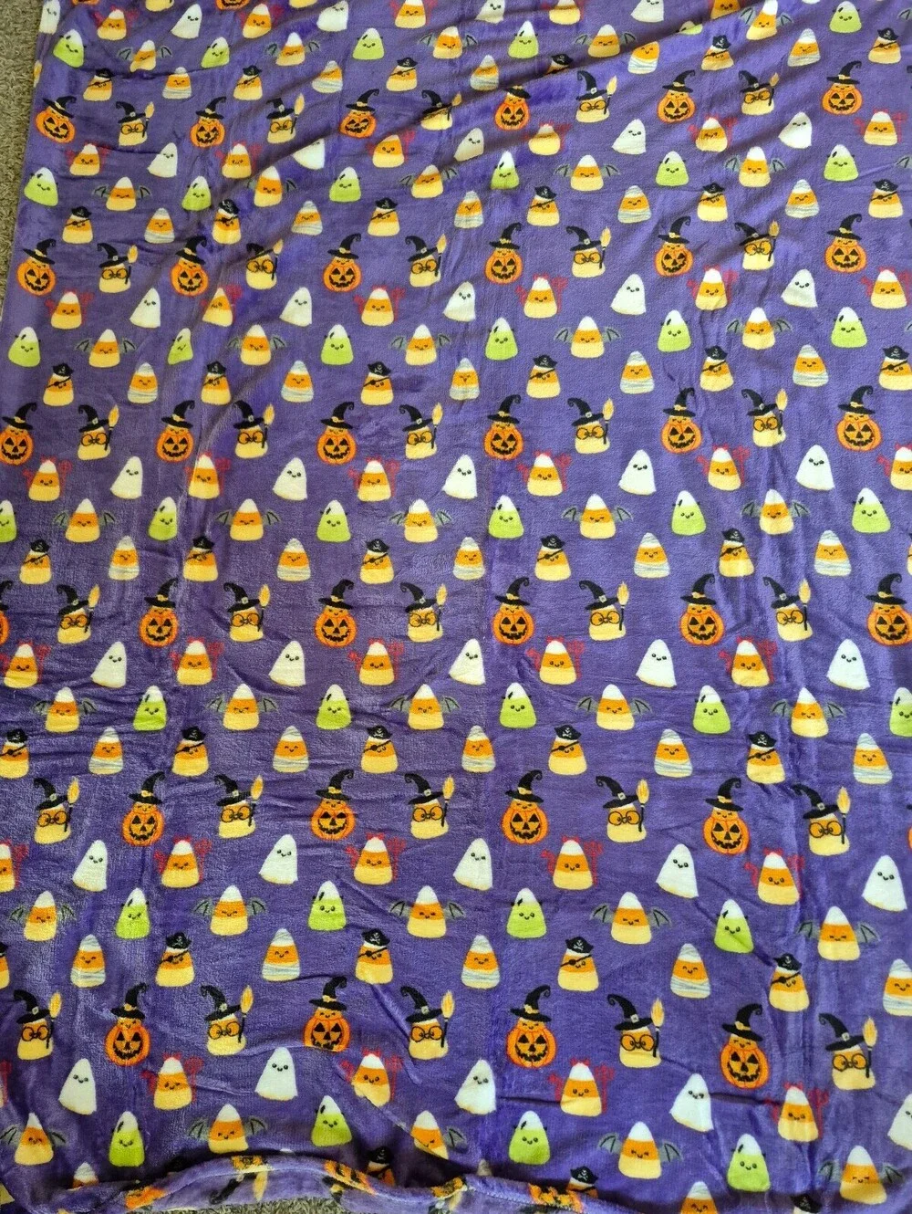 Halloween Themed Purple Fleece Blanket with Candy Corn and Pumpkin Pattern